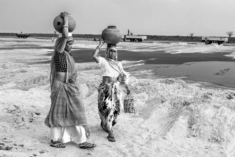 Impediments to enjoyment of Human Right to Water: 'Accessibility' Norm - Bringing the day's water ration from home due to lack of water source at a salt production site at Sambhar Lake in Jaipur district, Rajasthan
